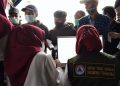 Peserta Membludak, Vaksinasi Kemerdekaan di Posko Satgas COVID-19 Abaikan Prokes