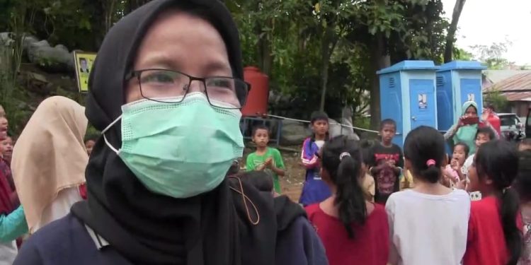 Ketgam : Petuga Tagana Kota Kendari Andria Foto : Annisa Aprilia Monoarfa